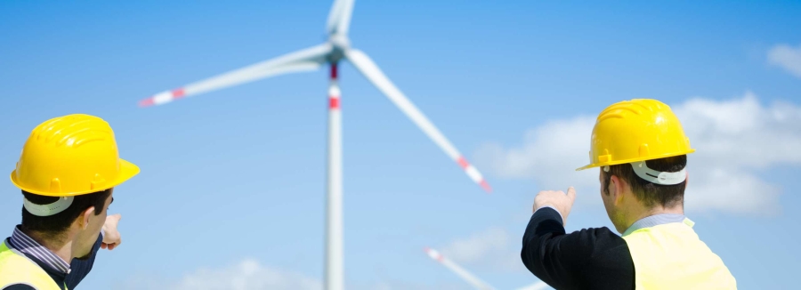 Supervisor engineer pointing the wind turbine