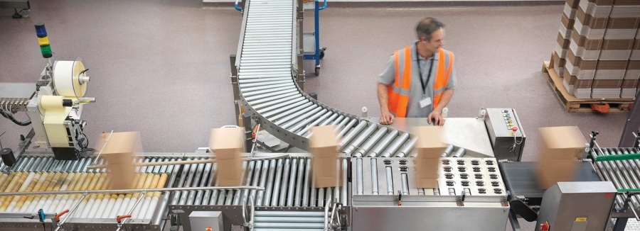 Workers managing the conveyor belt in a packaging facility, industrial automation, machine control, original equipment manufacturer.