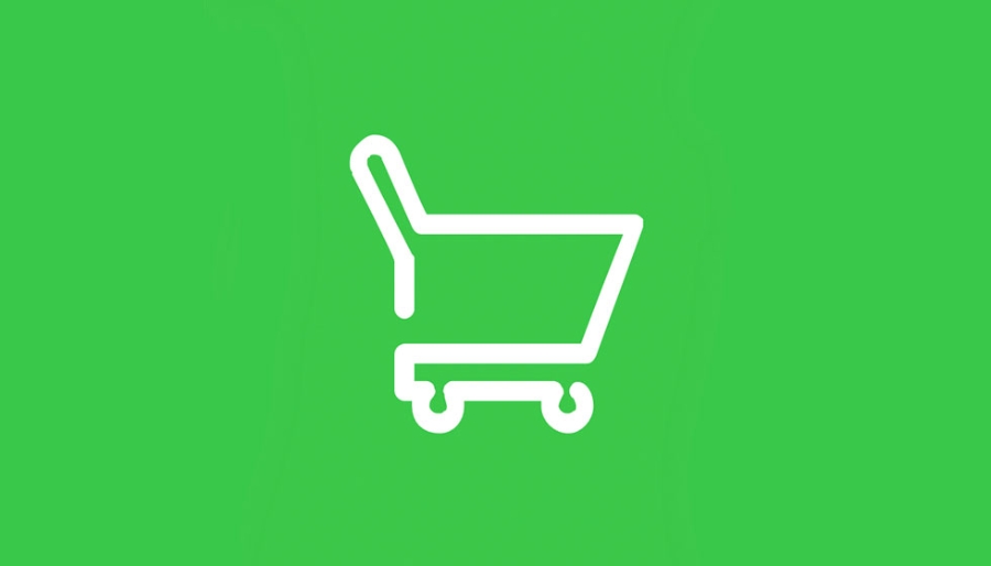 ícone branco do carrinho de compras em fundo verde