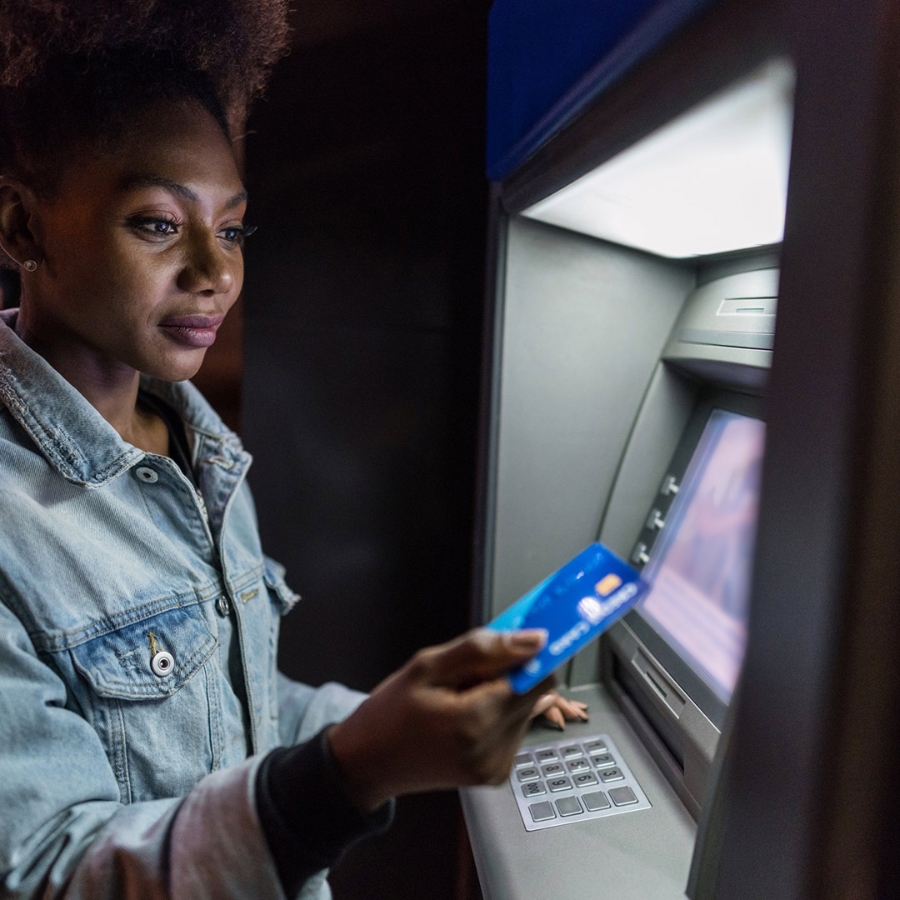 A woman using ATM