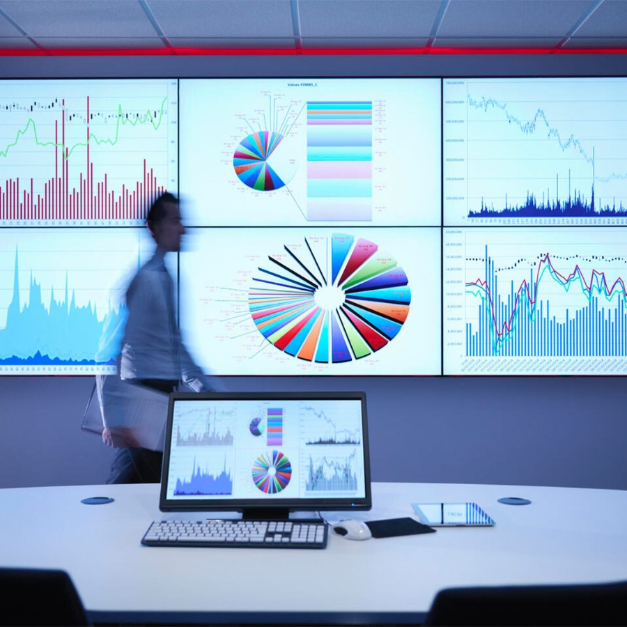 Employees Discussing about Statistical Data in Screen