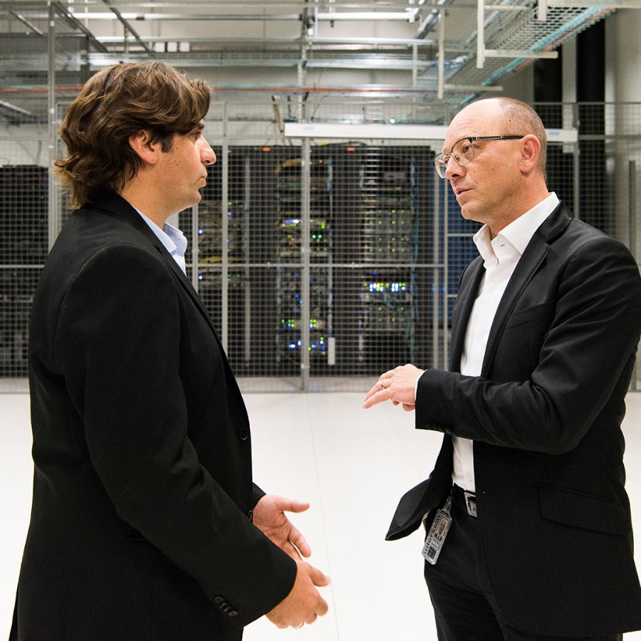 Two people in data center