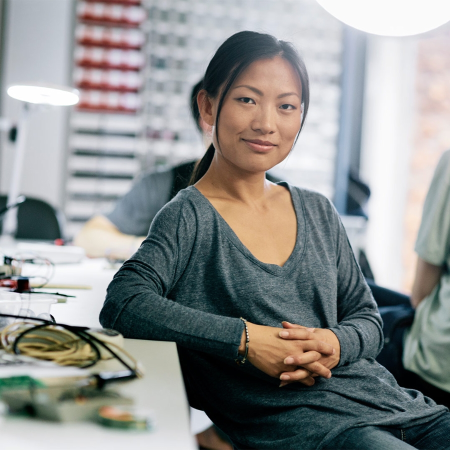 Woman sitting and smiling