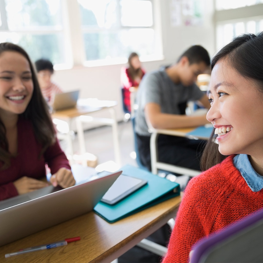 Female High School Student laughing in School